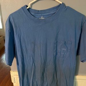 Guy Harvey tee. Looks like it is stained but it isn’t. No Logo on pocket